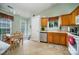 Bright kitchen with a breakfast table, stainless steel appliances, and tile flooring, offering functionality and style at 3606 White Swan Ct, Indian Trail, NC 28079