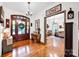 Inviting foyer with hardwood floors, a wooden front door, and decorative accents at 3871 Cool Branch Dr, Maiden, NC 28650