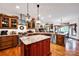 Open concept kitchen boasts an island with granite counters and stainless steel appliances, perfect for entertaining at 3871 Cool Branch Dr, Maiden, NC 28650