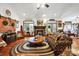 Inviting living room featuring a cozy fireplace, hardwood floors, and comfortable seating at 3871 Cool Branch Dr, Maiden, NC 28650