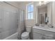 Clean bathroom featuring a shower/tub combo, toilet, and a vanity with a modern faucet at 4100 Alexander View Dr # 1, Charlotte, NC 28226