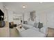 Comfortable living room featuring a large sectional sofa, open layout, and hardwood floors at 4100 Alexander View Dr # 1, Charlotte, NC 28226