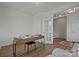 Office featuring a wooden desk, neutral walls and a modern door at 4100 Alexander View Dr # 1, Charlotte, NC 28226