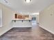 Inviting living room with wood floors and an open layout to the kitchen at 4149 River Run Cir, Hickory, NC 28602