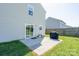 Backyard features well-maintained lawn, patio, and partial fence at 4315 Barnside Ln, Charlotte, NC 28216
