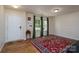 Welcoming entryway featuring a bright interior, laminate flooring, and a window for natural light at 4315 Barnside Ln, Charlotte, NC 28216