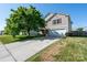 Charming two-story home with a well-maintained lawn, a mature tree, and a driveway leading to a two-car garage at 4315 Barnside Ln, Charlotte, NC 28216