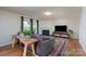 Comfortable living room featuring a fireplace, a large sectional couch, and plenty of natural light at 4315 Barnside Ln, Charlotte, NC 28216