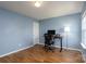 Office space with dark wood floors, a desk, and natural light at 4315 Barnside Ln, Charlotte, NC 28216