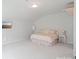 Spacious bedroom with carpet, a flat screen TV, and a comfortable queen bed at 476 Dudley Dr, Fort Mill, SC 29715