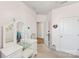 All-white vanity sits adjacent to a bedroom doorway at 476 Dudley Dr, Fort Mill, SC 29715