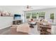 Comfortable living room features a plush sofa, hardwood floors, and a flat-screen TV at 476 Dudley Dr, Fort Mill, SC 29715
