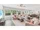 Spacious living room boasts hardwood floors, large windows, and ample natural light at 476 Dudley Dr, Fort Mill, SC 29715