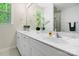 Bright bathroom featuring double sinks, quartz counters, and refined finishes at 513 Sandbar Pt, Lake Wylie, SC 29710