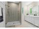Modern bathroom featuring a glass-enclosed shower, double vanity, and stylish finishes at 513 Sandbar Pt, Lake Wylie, SC 29710