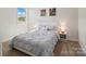 Cozy bedroom featuring comfortable bedding and modern decor at 513 Sandbar Pt, Lake Wylie, SC 29710