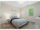 Comfortable bedroom with natural light, soft tones, and calming decor at 513 Sandbar Pt, Lake Wylie, SC 29710