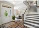 Elegant dining area featuring hardwood floors, staircase and lots of natural light at 513 Sandbar Pt, Lake Wylie, SC 29710