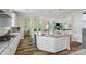 Open kitchen with a large island, stainless steel appliances, and granite countertops at 513 Sandbar Pt, Lake Wylie, SC 29710