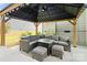 Cozy gazebo with plush seating, creating an inviting outdoor living space for relaxation and entertainment at 513 Sandbar Pt, Lake Wylie, SC 29710