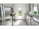 Modern kitchen features stainless steel appliances, granite countertops, and ample natural light at 6153 Helens Rest Ln, Lincolnton, NC 28092