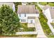 Aerial view of a two-story house with a driveway and fenced backyard at 6728 Mimosa St, Indian Trail, NC 28079