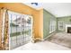Bright dining area connected to the living room, featuring a sliding glass door to the backyard at 6728 Mimosa St, Indian Trail, NC 28079