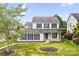 Charming two-story home with dark shutters and a well-manicured lawn at 6728 Mimosa St, Indian Trail, NC 28079