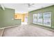 Open living space with large windows, sliding glass door, and seamless transition into the dining area at 6728 Mimosa St, Indian Trail, NC 28079