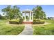 Founder's Park gazebo with a walkway in the front, lush green grass, and trimmed shrubs at 6728 Mimosa St, Indian Trail, NC 28079