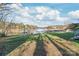 Picturesque backyard with lush lawn and a view of the lake and docks at 6778 Emerald Isle Dr, Sherrills Ford, NC 28673