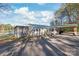 Scenic view of the home with screened porch and lake access at 6778 Emerald Isle Dr, Sherrills Ford, NC 28673