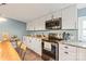 Modern kitchen featuring stainless appliances and granite countertops at 6778 Emerald Isle Dr, Sherrills Ford, NC 28673