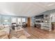 Inviting living room with blue walls, wood floors, and stylish furnishings at 6778 Emerald Isle Dr, Sherrills Ford, NC 28673