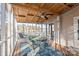Enclosed porch with a table, chairs, and scenic views of the lake at 6778 Emerald Isle Dr, Sherrills Ford, NC 28673