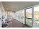 Relaxing sunroom with comfortable seating and scenic water views at 6778 Emerald Isle Dr, Sherrills Ford, NC 28673