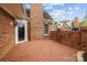 Private brick patio featuring brick wall surround and a door to the home's interior at 7502 Hurstbourne Green Dr, Charlotte, NC 28277