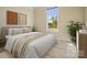 Comfortable bedroom with natural light, neutral tones, a plush bed and a view of the outdoors at 797 Latrobe Dr, Iron Station, NC 28080