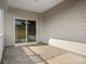 Inviting covered patio with sliding glass doors and an outdoor rug, perfect for relaxing at 797 Latrobe Dr, Iron Station, NC 28080