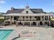 The community clubhouse pool and lounge area, perfect for relaxing at 797 Latrobe Dr, Iron Station, NC 28080