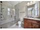 Bathroom with a glass-enclosed shower, granite countertop vanity, and tile flooring at 802 Capington Ln, Waxhaw, NC 28173