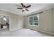 Spare bedroom featuring large window and closet near bonus room at 802 Capington Ln, Waxhaw, NC 28173