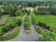 Aerial view of the community entrance featuring landscaped medians and tree-lined streets at 802 Capington Ln, Waxhaw, NC 28173