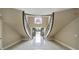 Stunning foyer featuring a split staircase and a chandelier over the entryway at 802 Capington Ln, Waxhaw, NC 28173