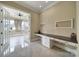 Bright office with a custom built-in desk and French doors leading to sunroom at 802 Capington Ln, Waxhaw, NC 28173