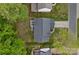 Overhead shot of a well-kept house boasting a spacious backyard, complemented by lush greenery for privacy and tranquility at 8600 Glade Ct, Huntersville, NC 28078