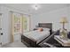 Comfortable bedroom with a large bed, ample natural light, and stylish geometric ceiling at 8600 Glade Ct, Huntersville, NC 28078