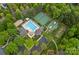 Aerial view of the community pool, offering a refreshing oasis with tennis and basketball courts at 8600 Glade Ct, Huntersville, NC 28078