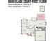Detailed first floor plan showcasing living areas, kitchen, and garage dimensions at 8600 Glade Ct, Huntersville, NC 28078