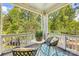 Cozy balcony with seating, perfect for enjoying the outdoors and relaxing with a view at 921 Northeast Dr # 39, Davidson, NC 28036